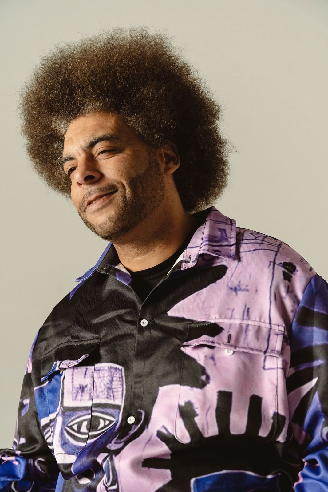 Little Moses Jones in a bold printed jacket, studio portrait